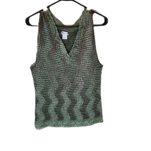 Nicola green sleeveless blouse.